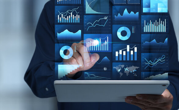 Data analytics KPI dashboard. Web analysis platform processing business intelligence data. Real time  performance charts and financial graphs. Businessman tapping digital tablet.
