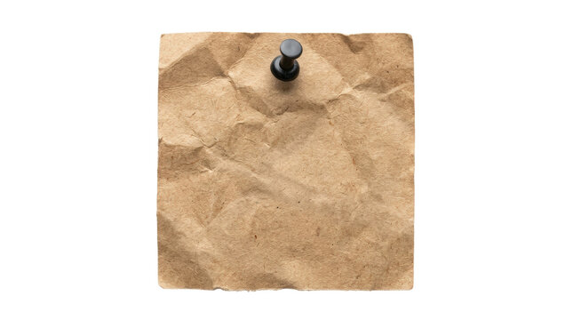 Brown crumpled paper pinned with thumbtack.