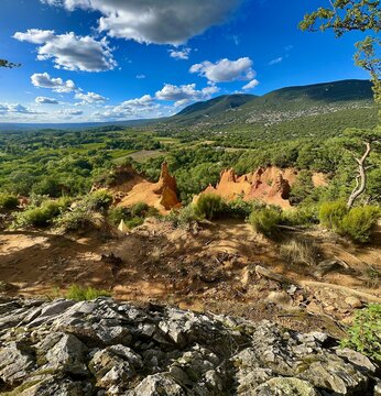 Panoramic view over the ochre cliffs and eroded pinnacles
