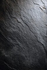 Fototapeta premium Slate chalkboard surface with dark grey texture used for writing and drawing in classrooms or homes during various activities and lessons throughout the day