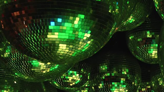 A vibrant birthday celebration unfolds at a dazzling disco. Shimmering disco balls cast radiant light on guests enjoying the dance floor, creating unforgettable memories this special evening.