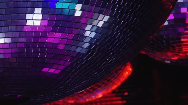 A dazzling birthday bash unfolds at a vibrant disco. Gleaming disco balls reflect dynamic bursts of light, painting the night with brilliant hues. Pure celebration and rhythmic joy fill the air.
