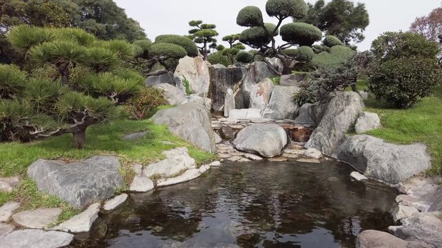 Bonsai Garden with Flowing Stream at the Japanese Garden in Buenos Aires, Argentina