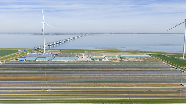 Kats, Zeeland, Netherlands - 08 April 2026: Aerial view of Fish Farm Basins near Zeelandbrug in Zeeland