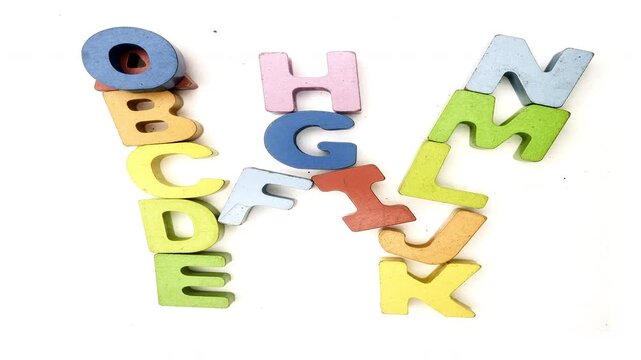 The Alphabet makes the letter W with wooden letters 