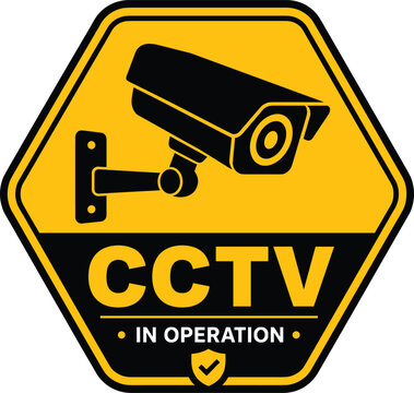 Yellow cctv surveillance sign in operation