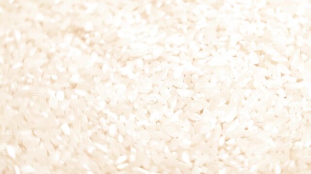 Rotation of rice as a texture close-up. Top side view	