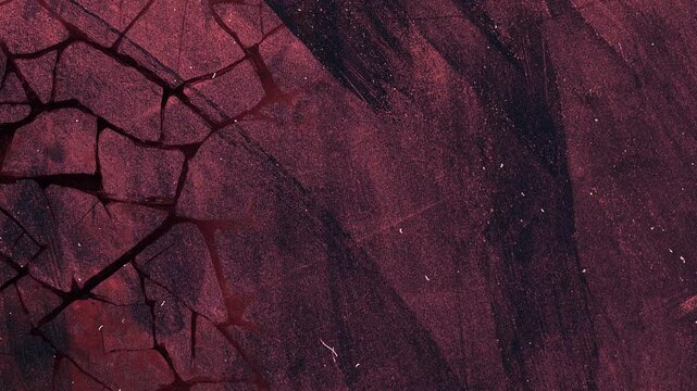 Dynamic abstract grunge-style background with cracks in a stone wall and a pink-and-blue brush texture, looping animation.