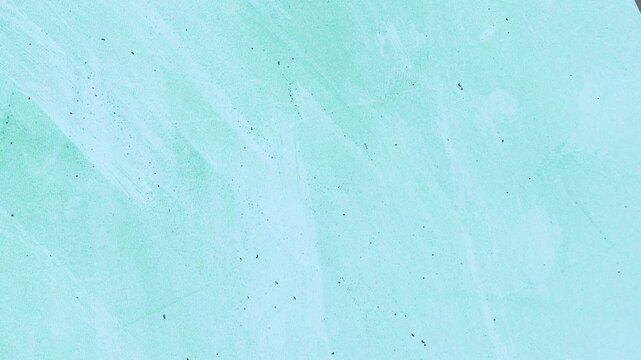 Dynamic abstract grunge-style background with noise and texture of brushstrokes on glass in light blue, looping animation.