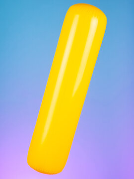 Close-up of an inflatable stick on a purple background, highlighting its simple and vibrant design. Perfect for fun and summertime play.
