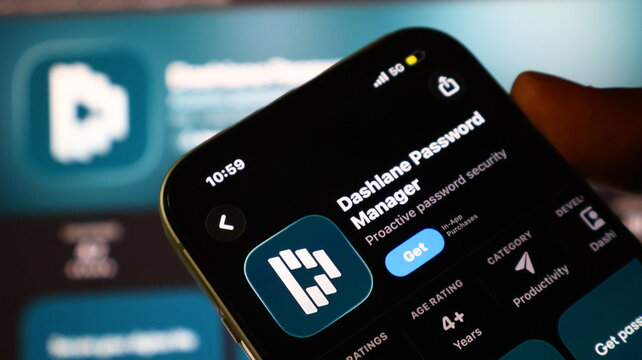 Dashlane password manager app on smartphone screen digital security technology.