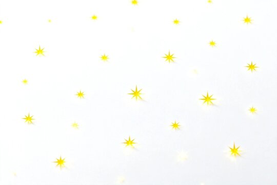Yellow Star Sparkles on White Background