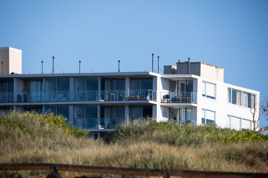 Modern Apartment Building Near Coastal Dunes
