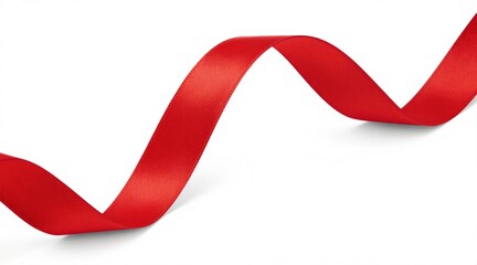 Fototapeta premium Smooth red satin ribbon gracefully curls on isolated white background. Use this elegant material for gift wrapping, celebrations, or festive decorations.