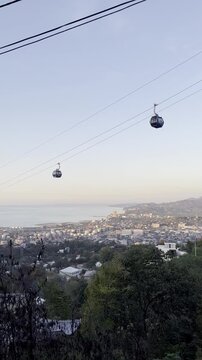 Panoramic Sunset View of Batumi City and Black Sea with Argo Cable Car, Georgia