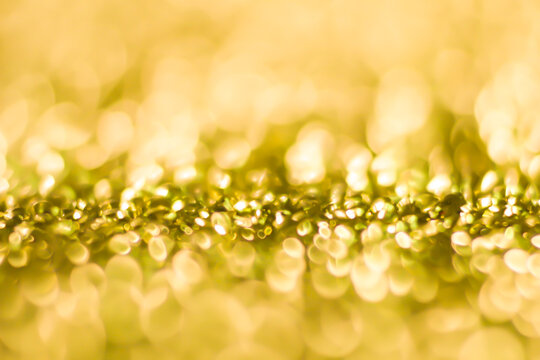 texture background Gold spring or summer, Christmas Glittering background.Holiday abstract texture