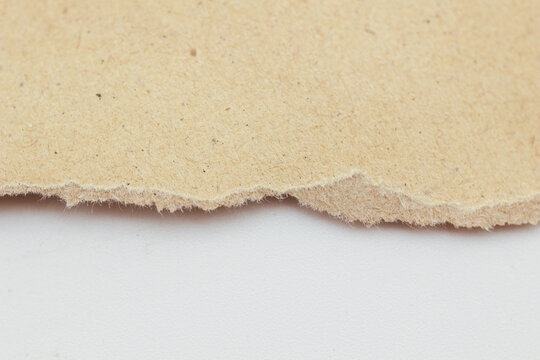 Torn cardboard background image Ripped piece of torn cardboard texture