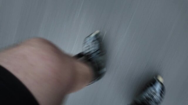 This shows a top view of roller legs in motion. The scene captures the movement of the rollers on a flat path. The legs push forward repeatedly, moving in a steady line.