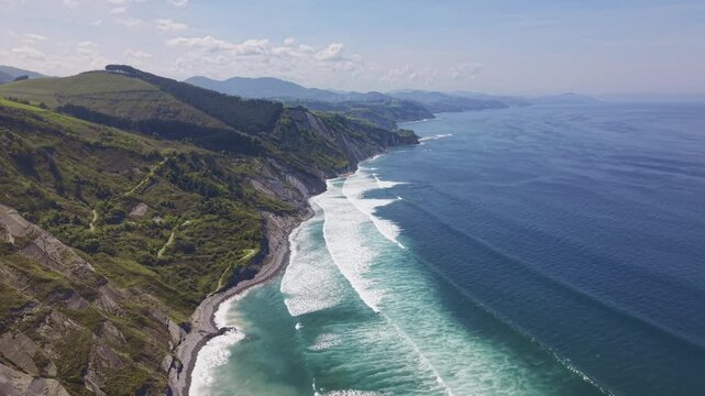 Coastal cliffs and ocean aerial panoramic landscape. Flysch Begiratokia - Baratzazarrak. Deva, Gipuzkoa, Spain.