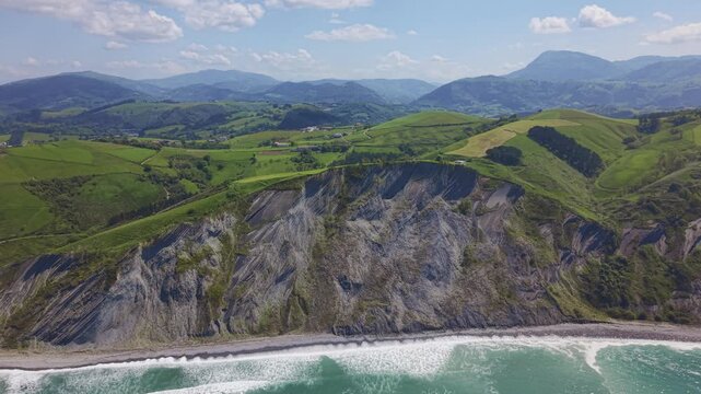 Rocky coastline and green cliffs aerial landscape. Flysch Begiratokia - Baratzazarrak. Deva, Gipuzkoa, Spain.