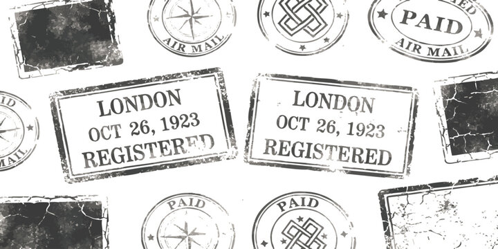 Vintage London postage stamps with registered and paid text markings on a collection of old postal mail marks