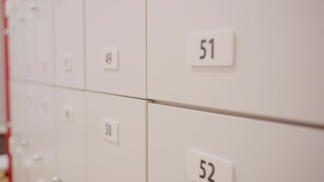 White numbered lockers in a changing room