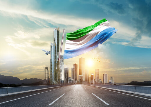 Sierra Leone national flag waving with modern and developed landscape.. Sierra Leone national flag for independence day.
