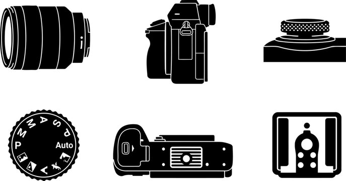 Digital camera photography equipment collection displaying dslr body lens and mode dial