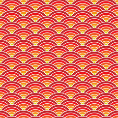 Vibrant red orange and yellow fish scale pattern background. © MdShariful