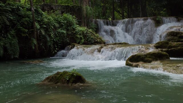 Turquoise Water Cascades Flowing Over Limestone Tiers At Huai Mea Khamin Waterfall In Kanchanaburi Thailand