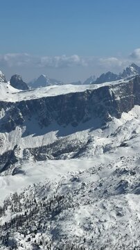 Majestic snow-covered peaks and rugged alpine scenery at Cortina d&rsquo;Ampezzo in the Dolomites, Italy. Dramatic winter landscape in the Dolomiti Superski region
