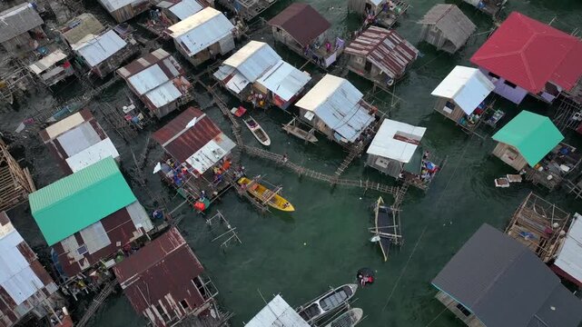 Aerial View on traditional stilt houses of Sama-Bajau people in Semporna. Sea Gypsies of Island Borneo, Sabah, Malaysia.