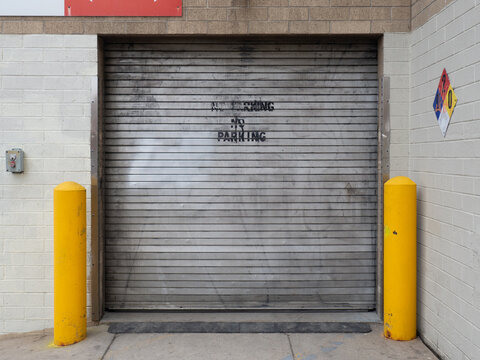 grimy metal rolling shutter door