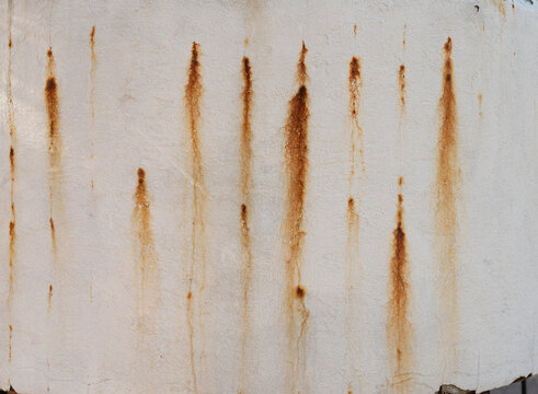 rust stains on painted surface