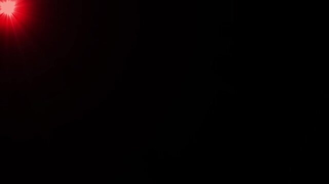 red sun shining light effect with rotating sunlight rays on black background Chroma Key ,Sunlight rays of light bright light on black screen background, Abstract red sun light rays emanating HD