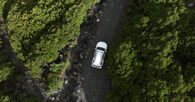 Aerial footage car road trip on the high altitude mountain trail, China