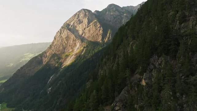 Beautiful aerial view of mountain peaks and forested valleys in Tyrol Austria highlighting alpine wilderness and tourism destinations in Europe