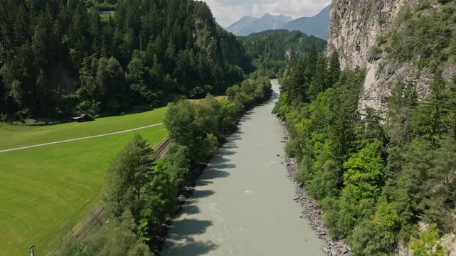 Beautiful aerial panorama of Otztaler Ache River in Tyrol Austria featuring alpine wilderness forests mountain scenery and tourism opportunities