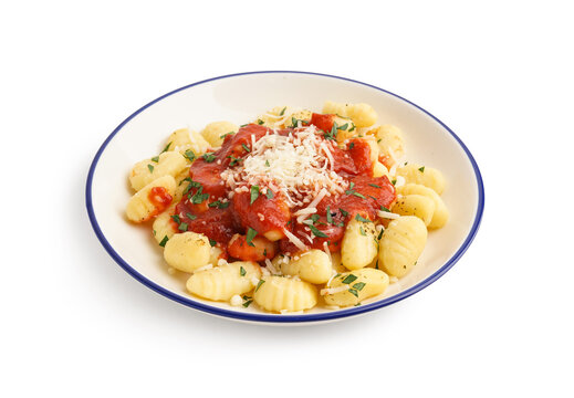 Plate of tasty gnocchi with tomato sauce and cheese on white background