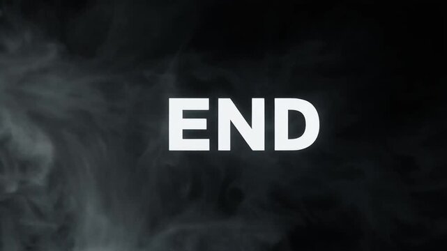 黒背景で白い煙が晴れて現れるENDテキスト 解決やエンディングのコンセプト