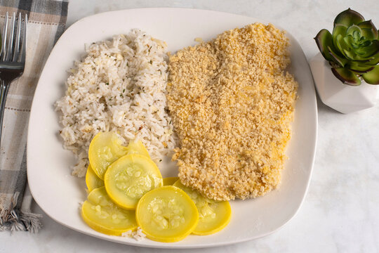 baked haddock  with  summer squash and rice