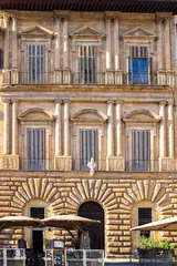 Historic Italian Palace Facade with Classical Columns and Tourist Restaurant on Ground Floor in Florence Italy © BlackMac