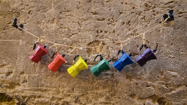 Colorful Coffee Pot Hanging on Ancient Stone Wall Casperia Medieval Borgo Italy Vivid Moka Pots Decoration Traditional Italian Kitchenware Aesthetic Charming Decorative Details Authentic lifestile 