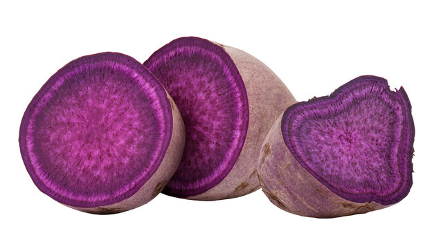 Isolated fresh purple sweet potato slices showing vibrant color and starchy texture