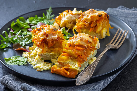 Cheesy Veggie Baked White Fish on a plate