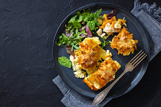 Cheesy Veggie Baked White Fish on a plate