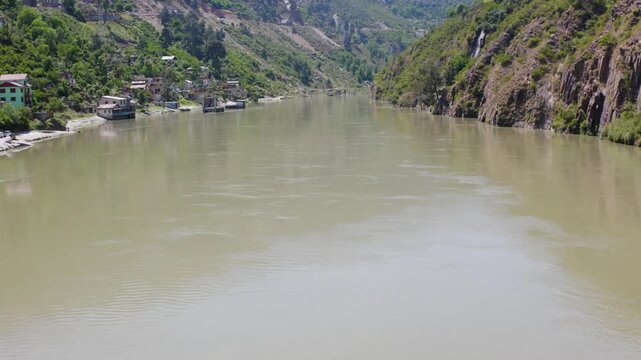 Low angle drone flight over the Chenab River