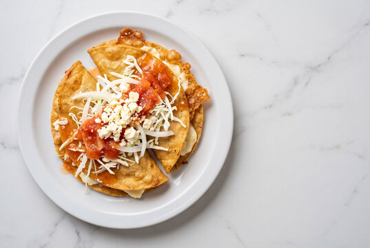 Dobladas - Guatemalan Folded Fried Tortillas with Cheese and Salsa - With Copy Space