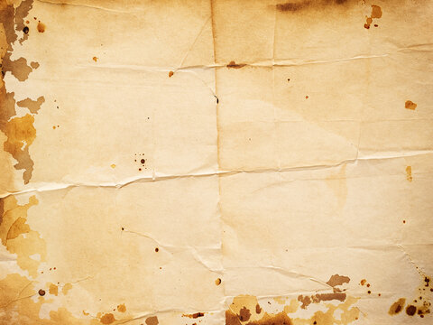 A high resolution vintage paper texture featuring authentic creases and aged brown coffee stains, perfect as a rustic background for creative design projects, historical documents, or artistic