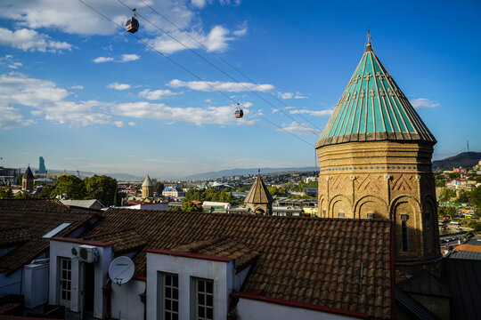 Tbilisi Old Town vista with Sioni Cathedral bell tower, Rike Park Aerial Tramway, Georgia